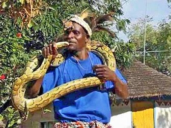 Sukuma Traditional Dance a Man with a Snake at Bujora Museum - african cultural tourism